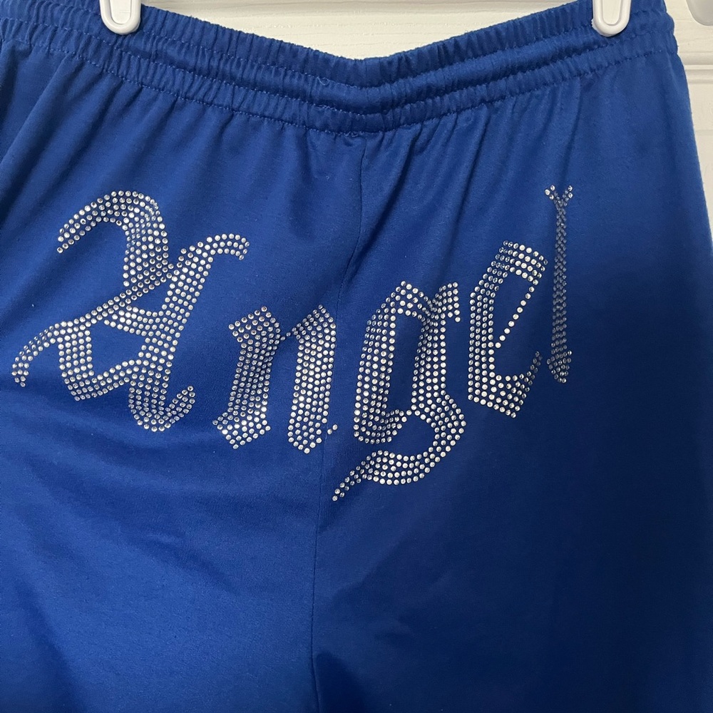 Royal blue sweat pants . No rips , No tears.